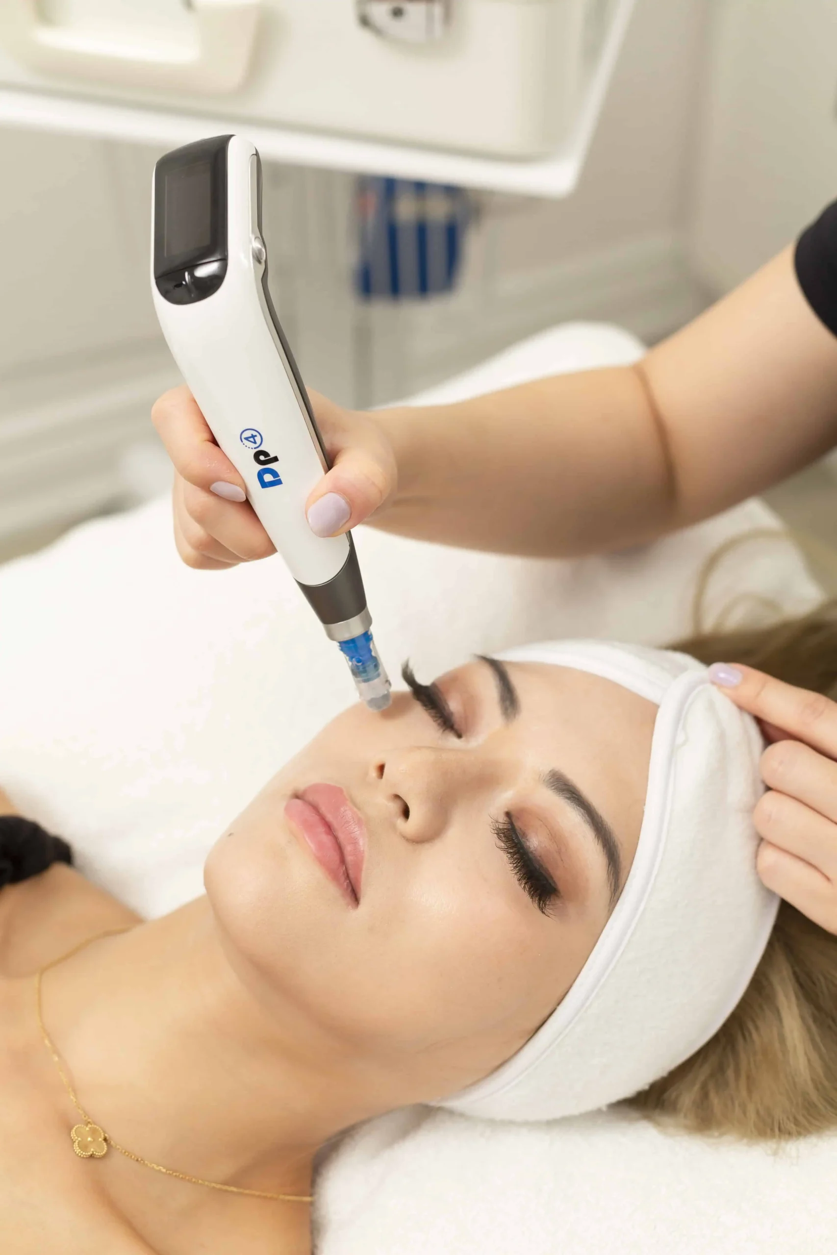 Hydrafacial device used on woman’s face for deep cleansing treatment